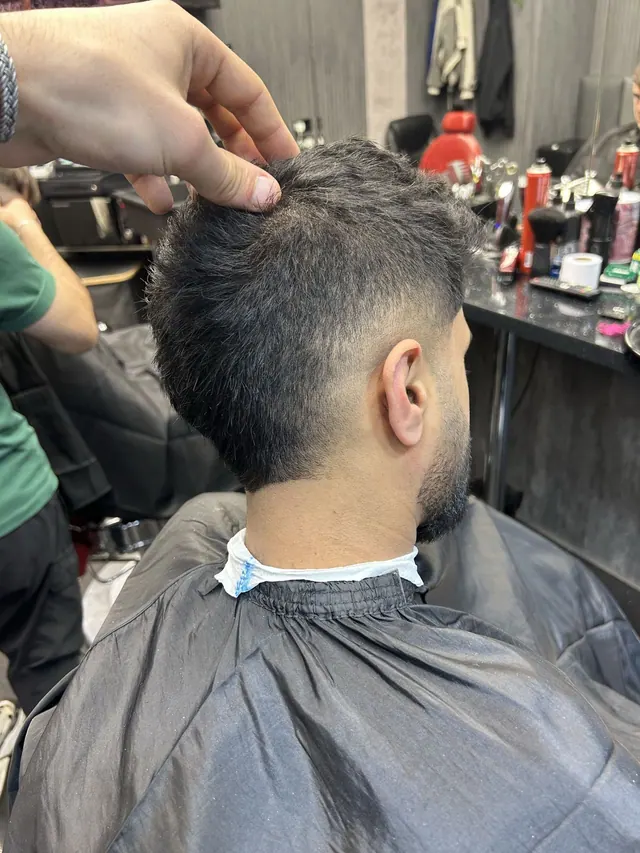 A textured cut with a fade, from behind